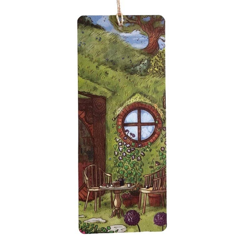 Hand-illustrated "Breakfast at the Shire" bookmark on premium textured paper. A cozy, literary-inspired keepsake for book lovers and fantasy fans alike!