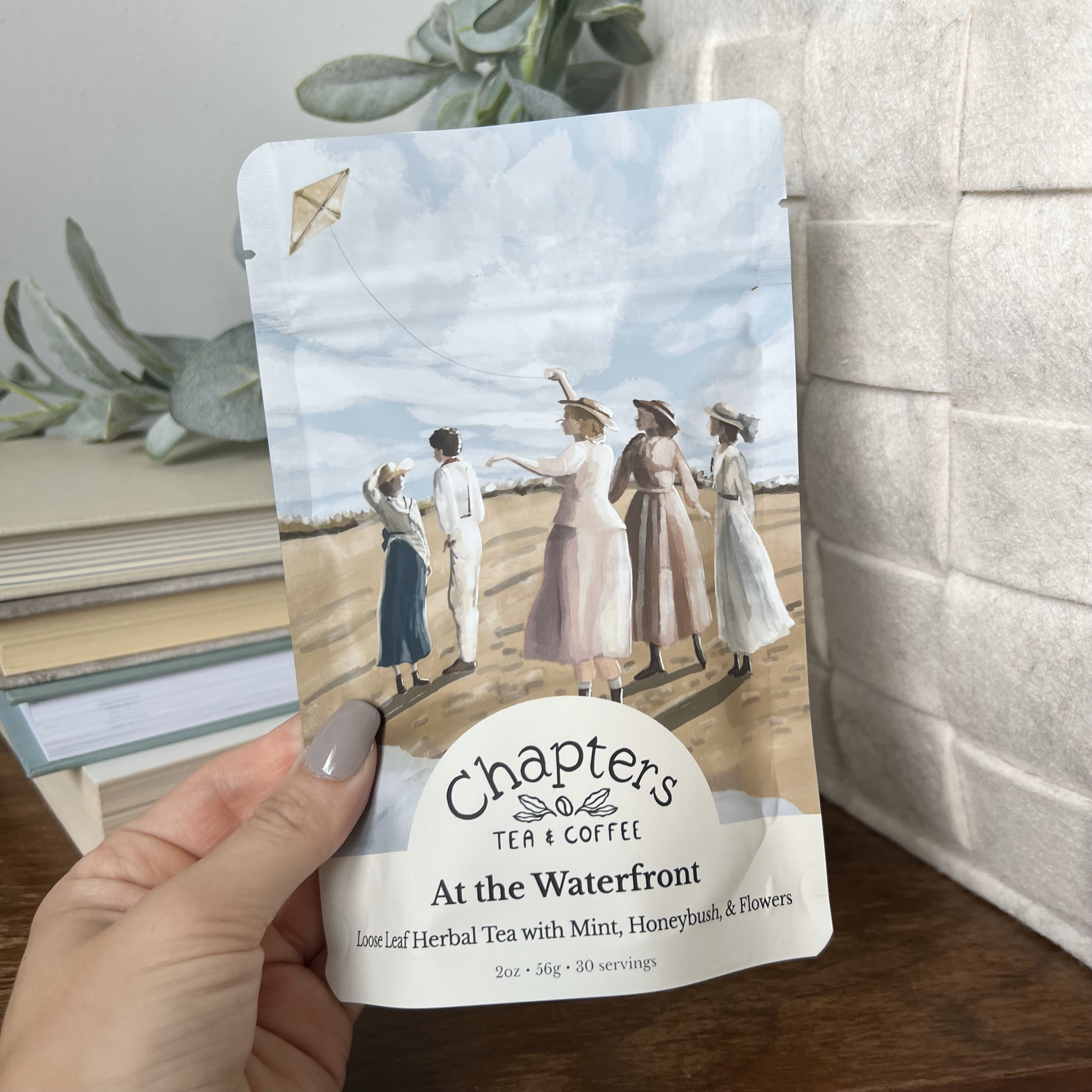 Elevate your tea ritual with our "At The Waterfront" blend, inspired by Little Women. This sweet, fruity tea with a refreshing mint finish captures the charm of Louisa May Alcott’s classic. Caffeine-free and made from natural ingredients, it&