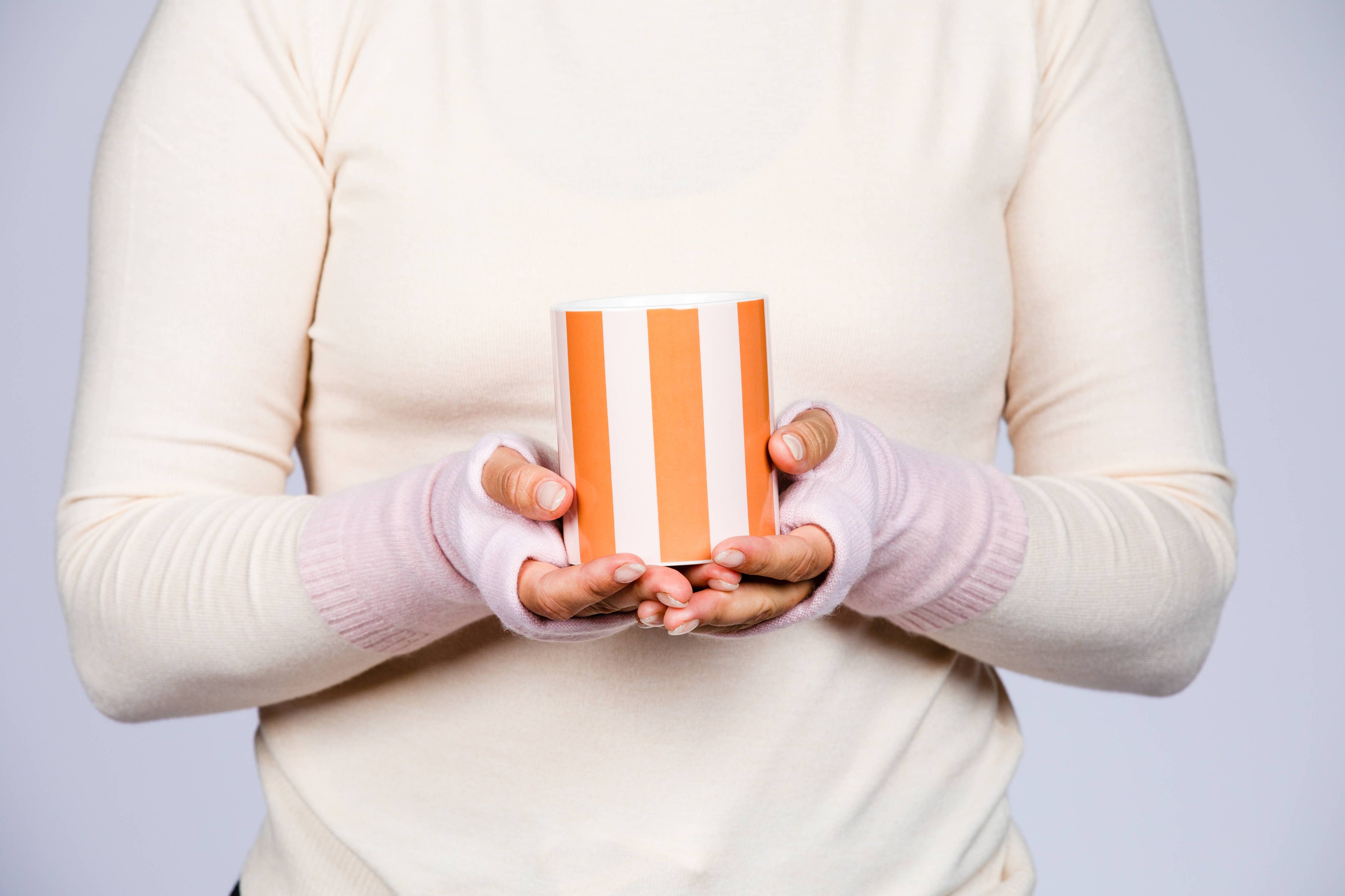 B.B. Sheep upcycled cashmere wrist warmers & fingerless gloves. Soft, warm, breathable, and sustainable—cozy comfort with second-chance style.