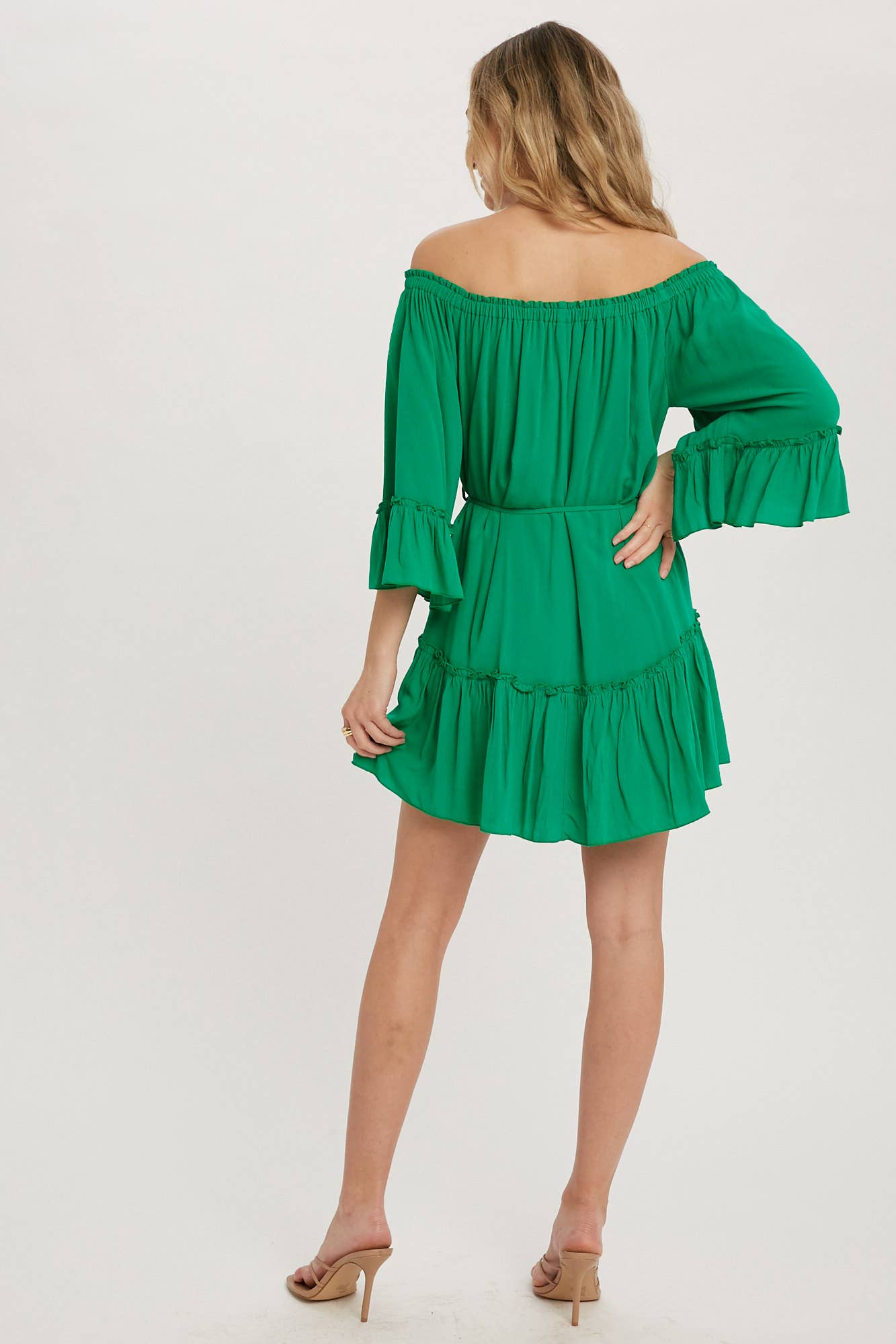 Romantic off-shoulder dress with ruffled sleeves, frilled hem, and a swingy silhouette. Adjustable belt adds shape to this breezy, flounce favorite.