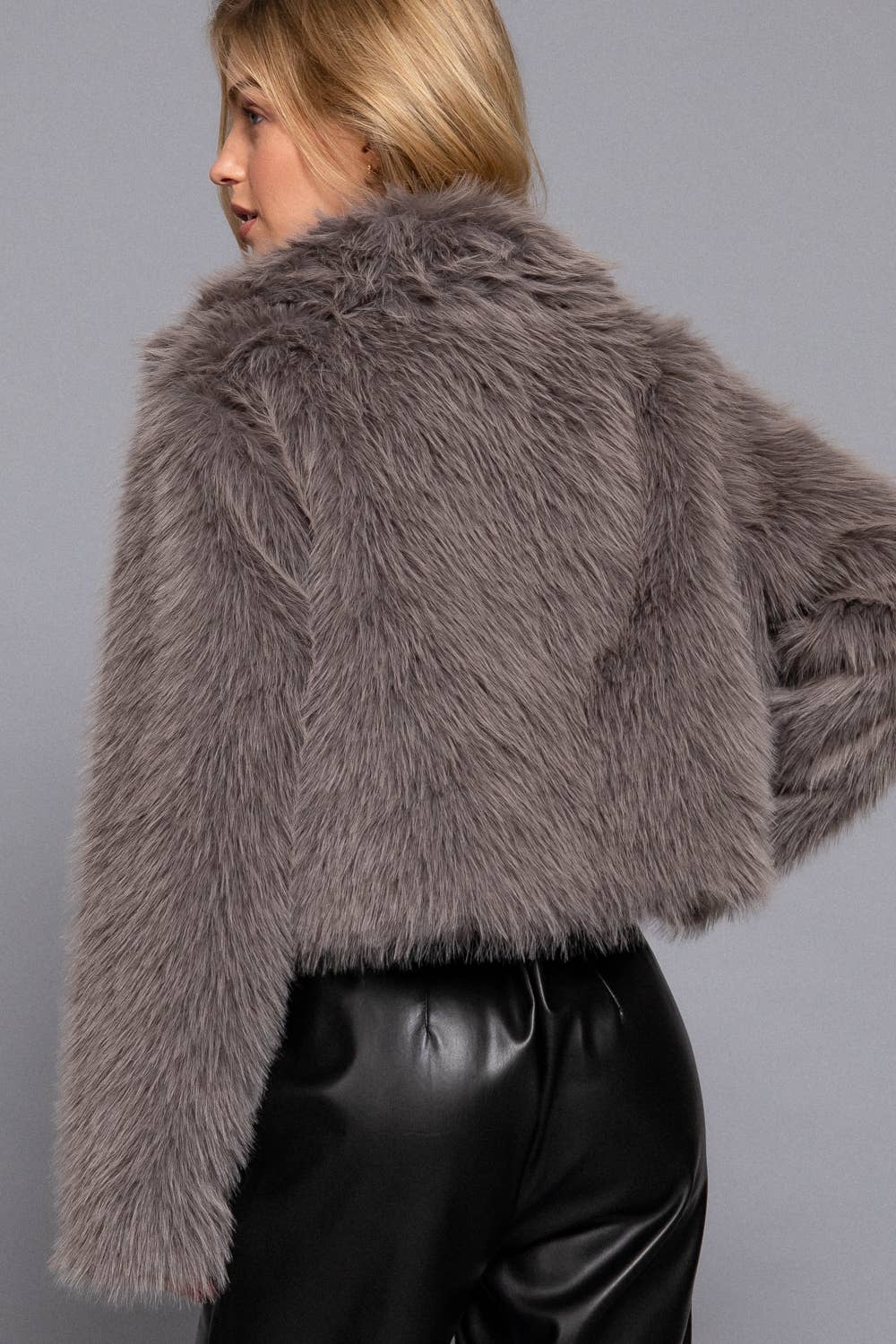 Notched Collar Faux Fur Crop Jacket with plush texture, single-button closure and chic cropped fit. A cozy, stylish layer for casual or evening looks.