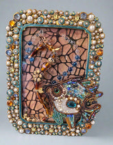 Add a splash of nautical charm with Jeweled Fish Frames, featuring handcrafted aquatic motifs in high-quality beads, glass, wood, and metal. These 4" x 6" frames blend intricate craftsmanship with vintage-inspired elegance, making them perfect for walls, shelves, or gallery displays. A unique decor statement!