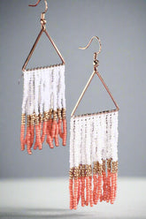 Make a statement with these coral, gold, and white beaded fringe earrings. Lightweight, hypoallergenic, and stylish—perfect for any look, day or night!
