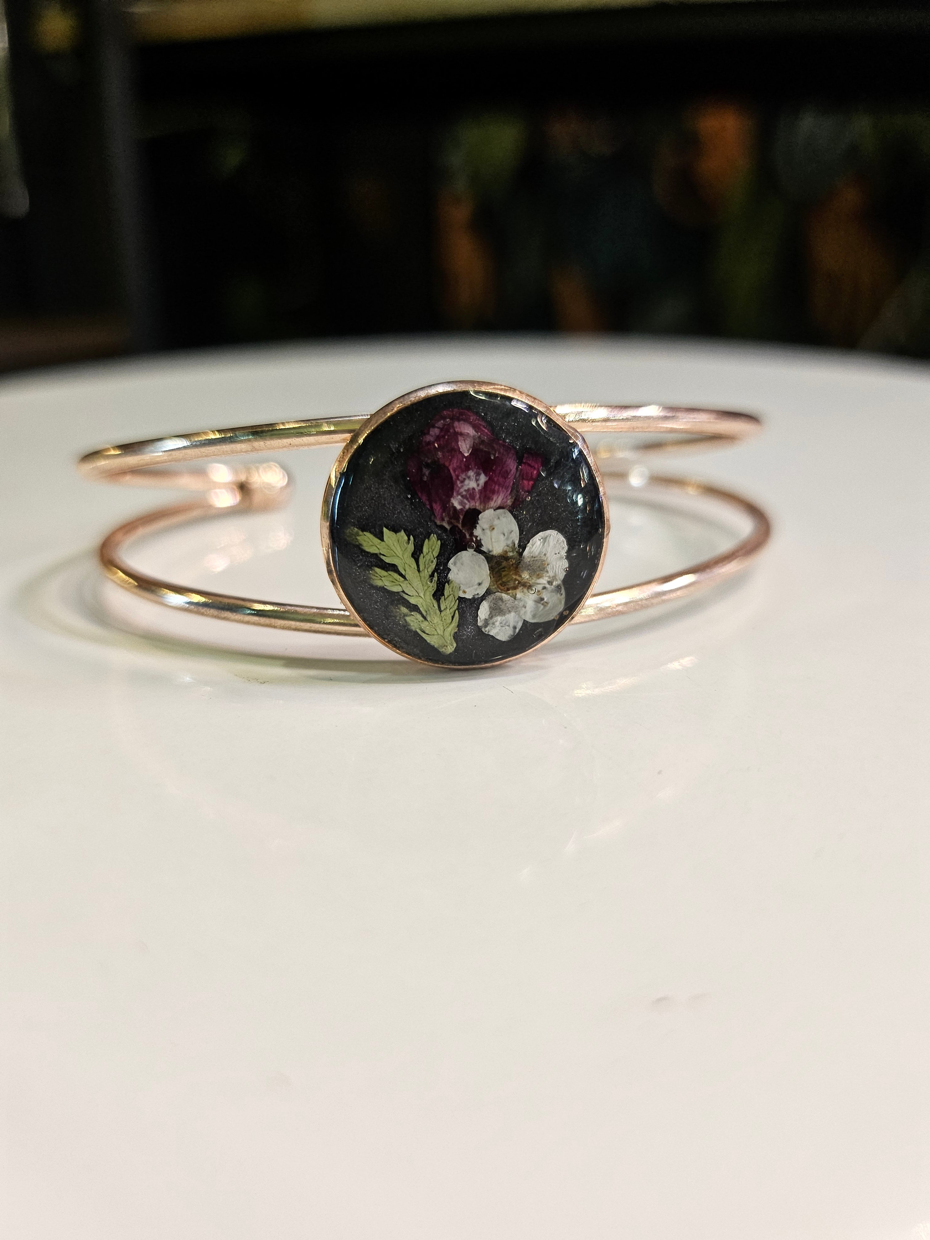 Handcrafted floral resin bracelets with real dried flowers. Unique, nature-inspired jewelry that adds whimsical charm and elegance to any outfit.