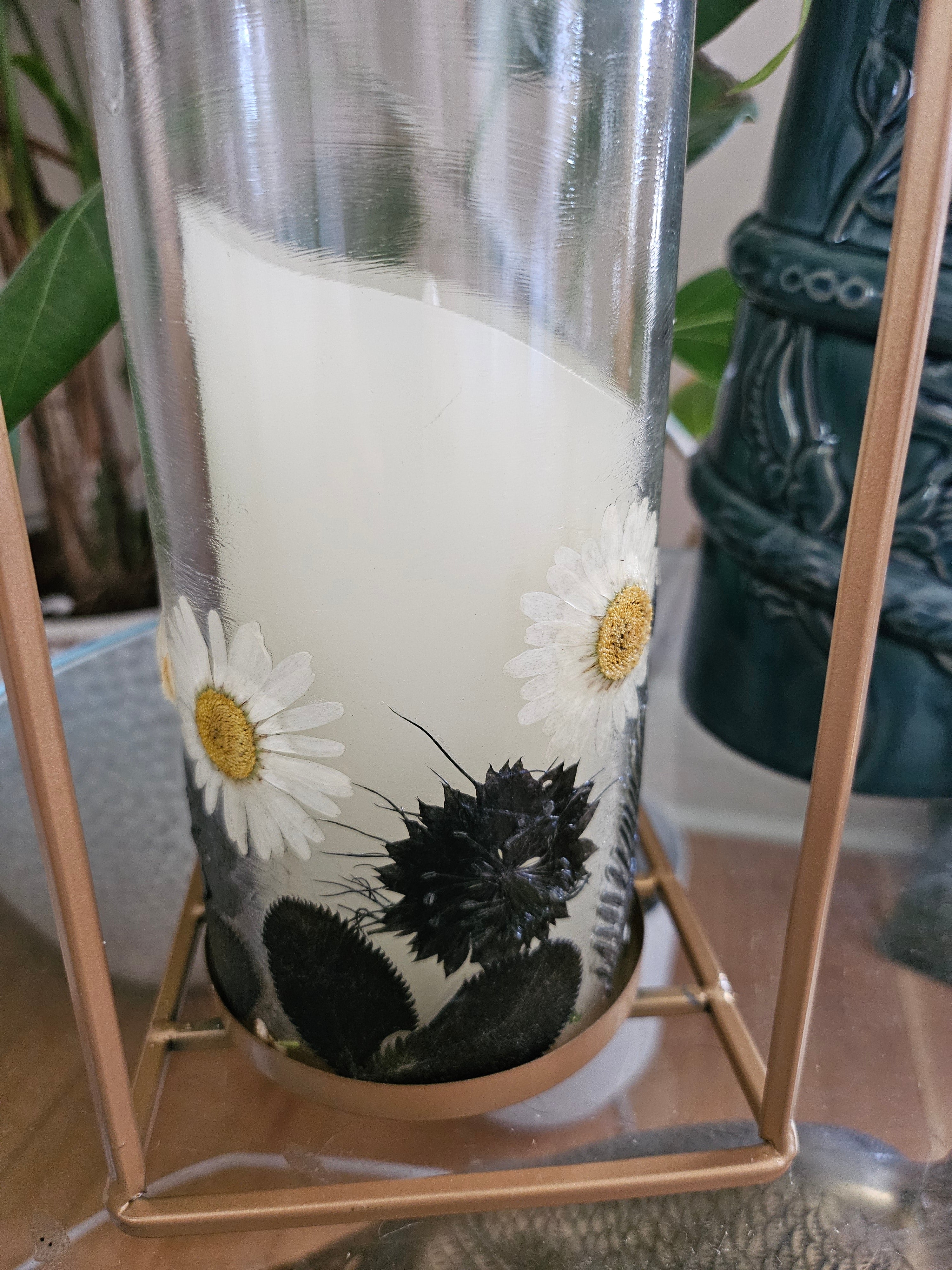 Fairy Pressed Flower Lantern with gold frame & glass panels glows with soft candlelight through real black & white flowers. 12" tall, perfect for spa or gift.