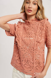 Romantic crochet lace top with frills, scalloped edges, and a relaxed fit. Perfect for layering over camis or dresses. A dreamy, vintage-inspired staple.