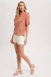 Romantic crochet lace top with frills, scalloped edges, and a relaxed fit. Perfect for layering over camis or dresses. A dreamy, vintage-inspired staple.