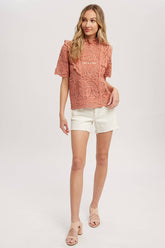 Romantic crochet lace top with frills, scalloped edges, and a relaxed fit. Perfect for layering over camis or dresses. A dreamy, vintage-inspired staple.