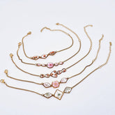 Gold-plated bracelet with real dried flowers in a geometric resin charm. Lightweight, adjustable, and perfect for nature-inspired, elegant everyday wear.