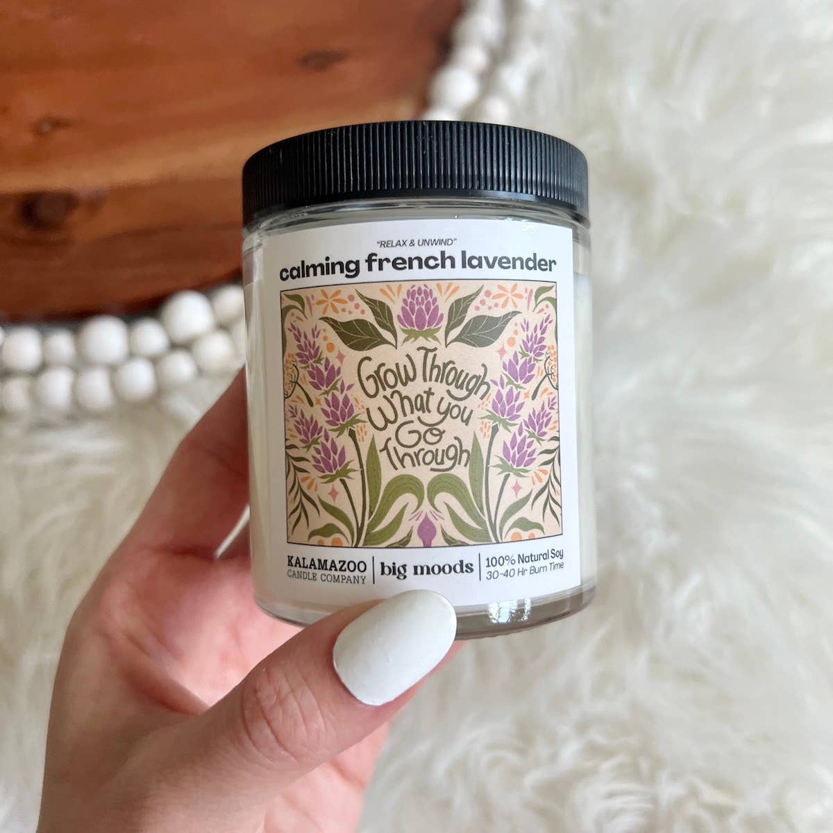 Grow Through What You Go Through: A calming French lavender 5oz soy candle. Vegan, eco-friendly, and hand-poured for 30–40 hours of peaceful aromatherapy.