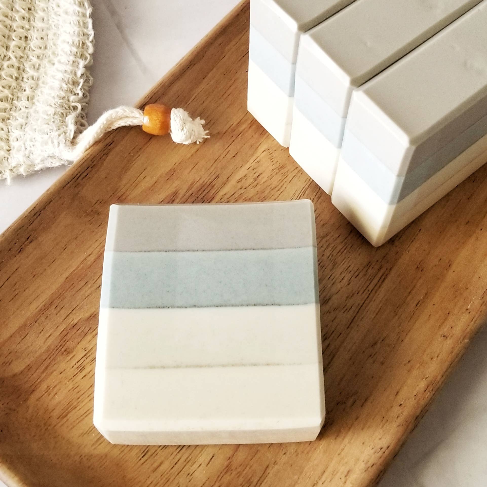 Coastal Fog Oatmeal Soap—lavender, Earl Grey, honey & amber blend. Gently exfoliating, sulfate-free, and inspired by San Francisco’s misty mornings.