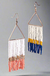 Make a statement with these coral, gold, and white beaded fringe earrings. Lightweight, hypoallergenic, and stylish—perfect for any look, day or night!