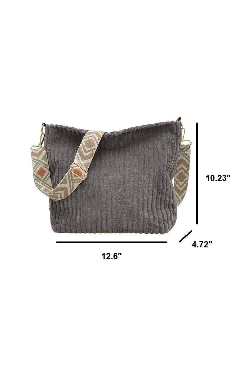 Corduroy Tote Bag with adjustable guitar strap, zipper closure and roomy design. A soft, stylish everyday shoulder bag for work, travel or nights out.