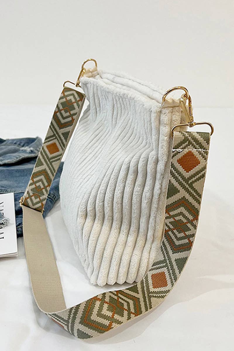Corduroy Tote Bag with adjustable guitar strap, zipper closure and roomy design. A soft, stylish everyday shoulder bag for work, travel or nights out.