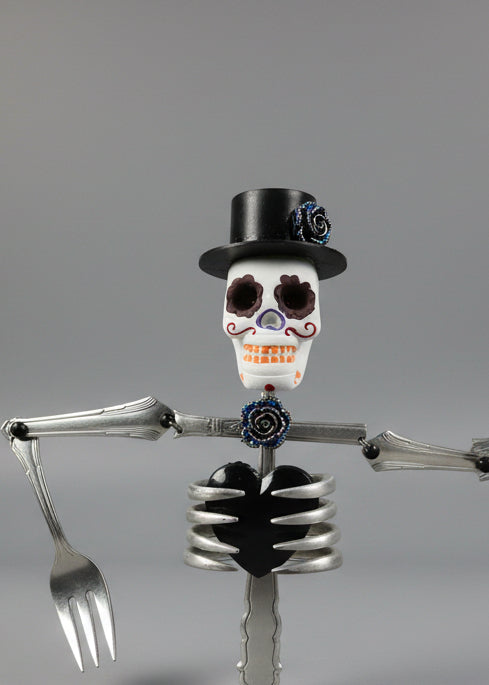 Skeleton Rattle & Bone Hanging Chime handcrafted from vintage silverware with crystal accent—whimsical skeleton wind chime with soft sound and one-of-a-kind charm.