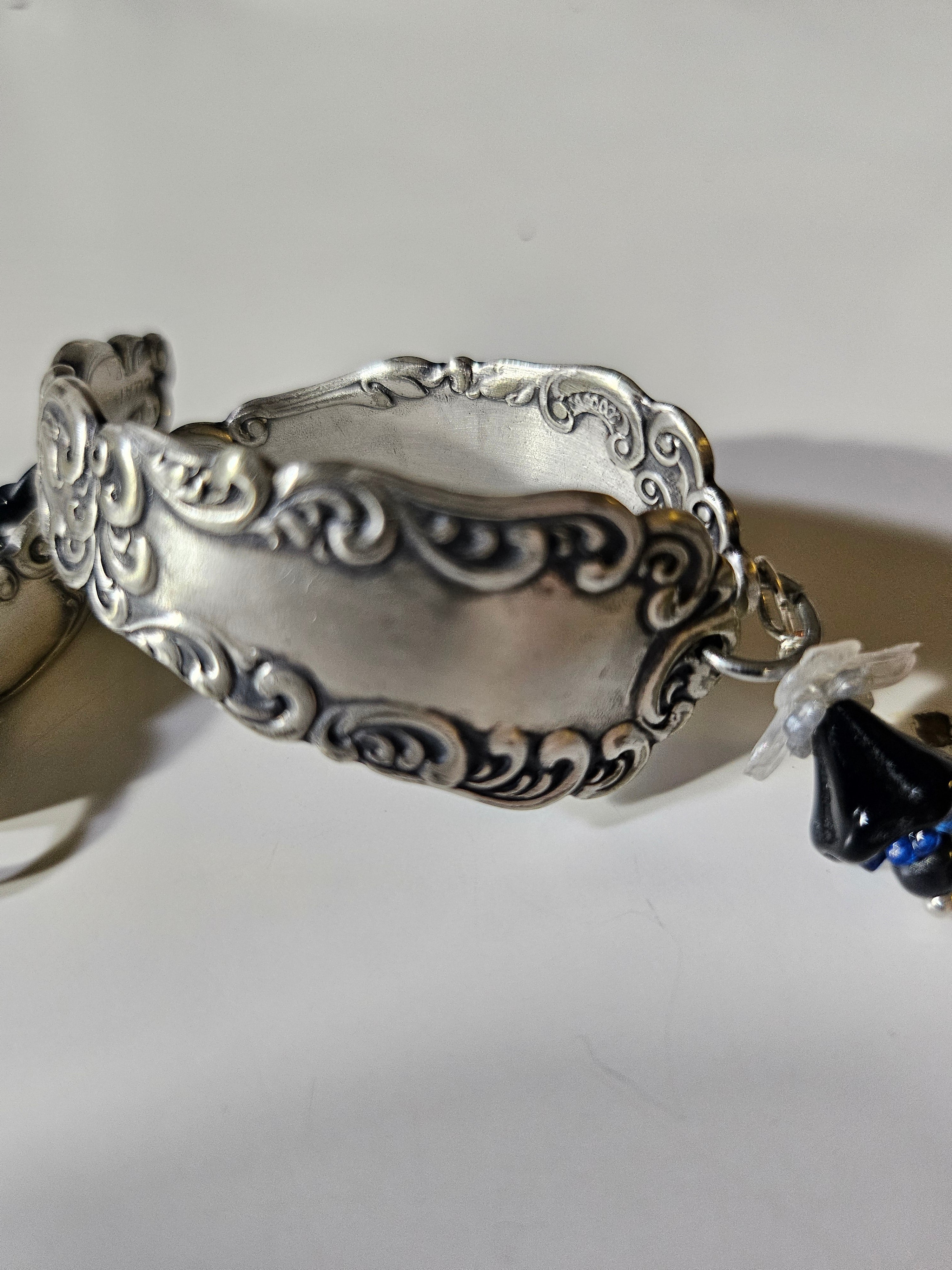 The American Beauty Vintage Bracelet is a handcrafted treasure made from authentic 1900-1940s American Beauty