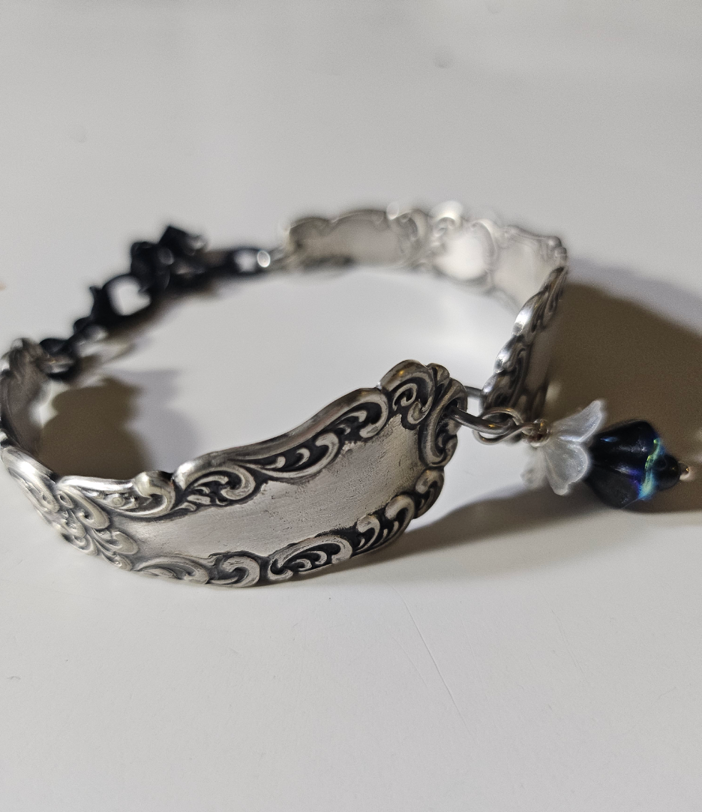 The American Beauty Vintage Bracelet is a handcrafted treasure made from authentic 1900-1940s American Beauty