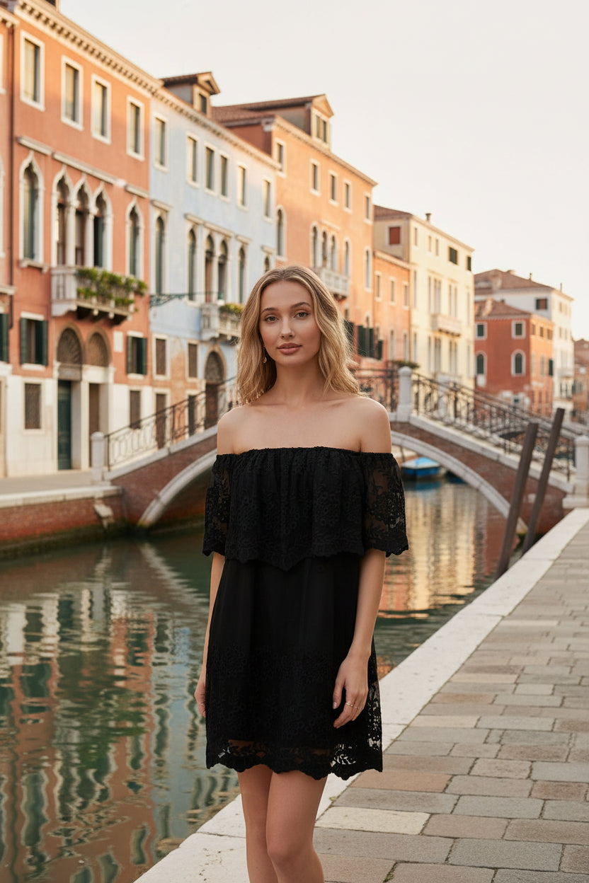 Off-the-shoulder floral lace mini dress with elastic neckline and swingy flounce silhouette. Romantic woven lace, scalloped hem, feminine fit.