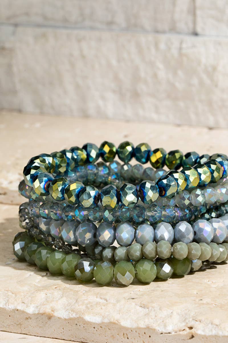 Shimmer in style with this 9-piece faceted glass bead bracelet set. Stack for bold elegance or wear solo for a touch of sparkle. Nickel & lead compliant!