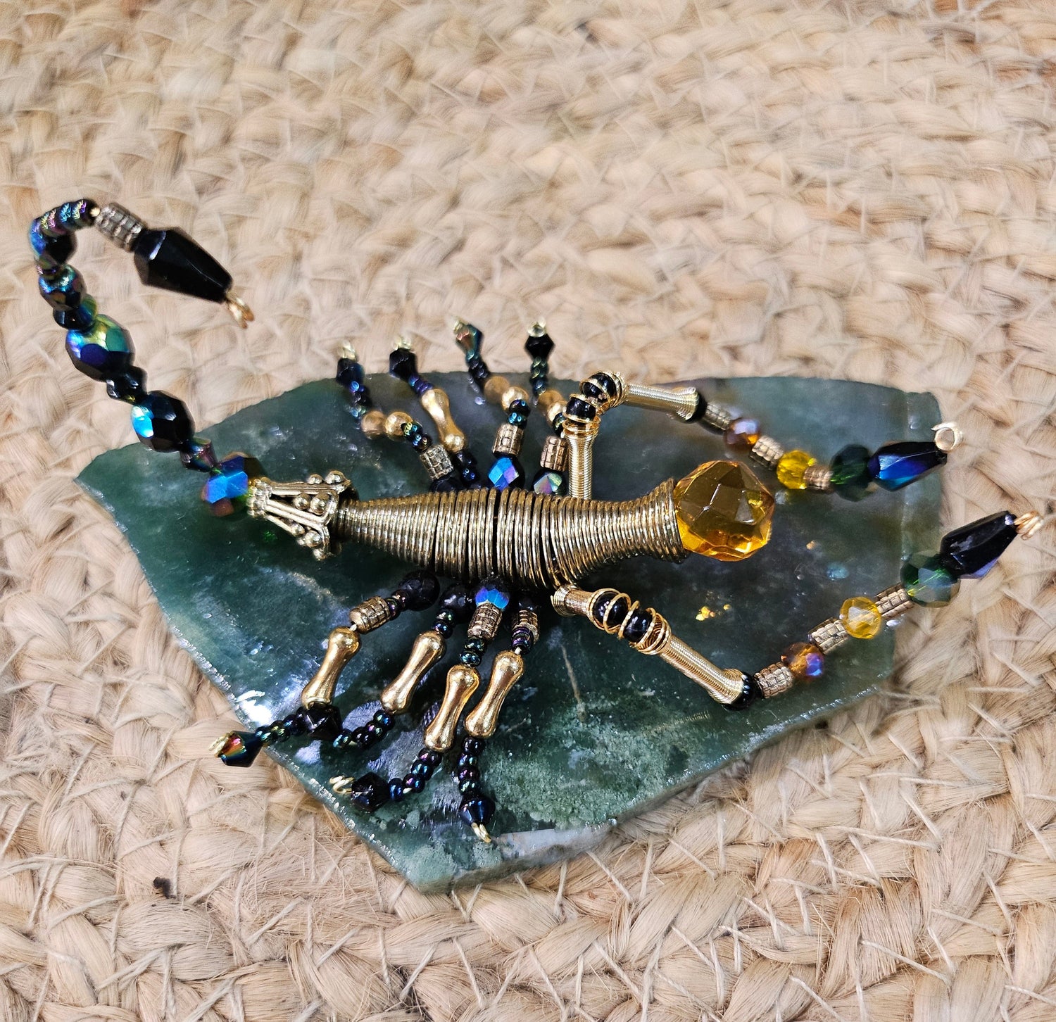 Discover KStonely’s Jeweled Insect and Creature Art on Semi-Precious Stone, featuring stunning 3D beaded sculptures. Crafted with glass crystals, agate, pearls, and fine beads on semi-precious stone. Each piece celebrates nature’s beauty. Perfect as decor or gifts.