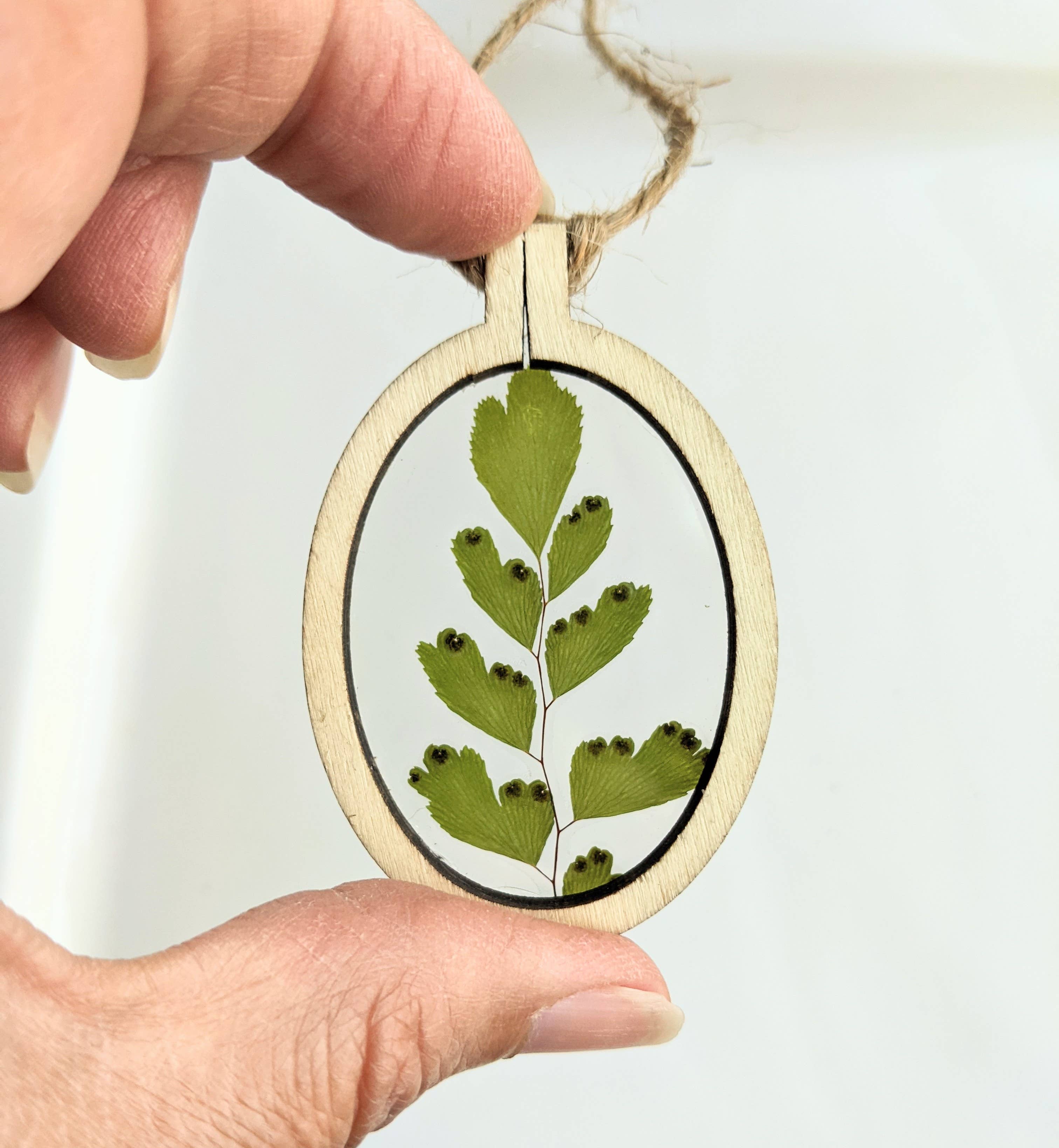 Handcrafted wood frame ornaments with real pressed flowers or leaves. Unique, nature-inspired décor perfect for holiday trees, gifts, or year-round charm.