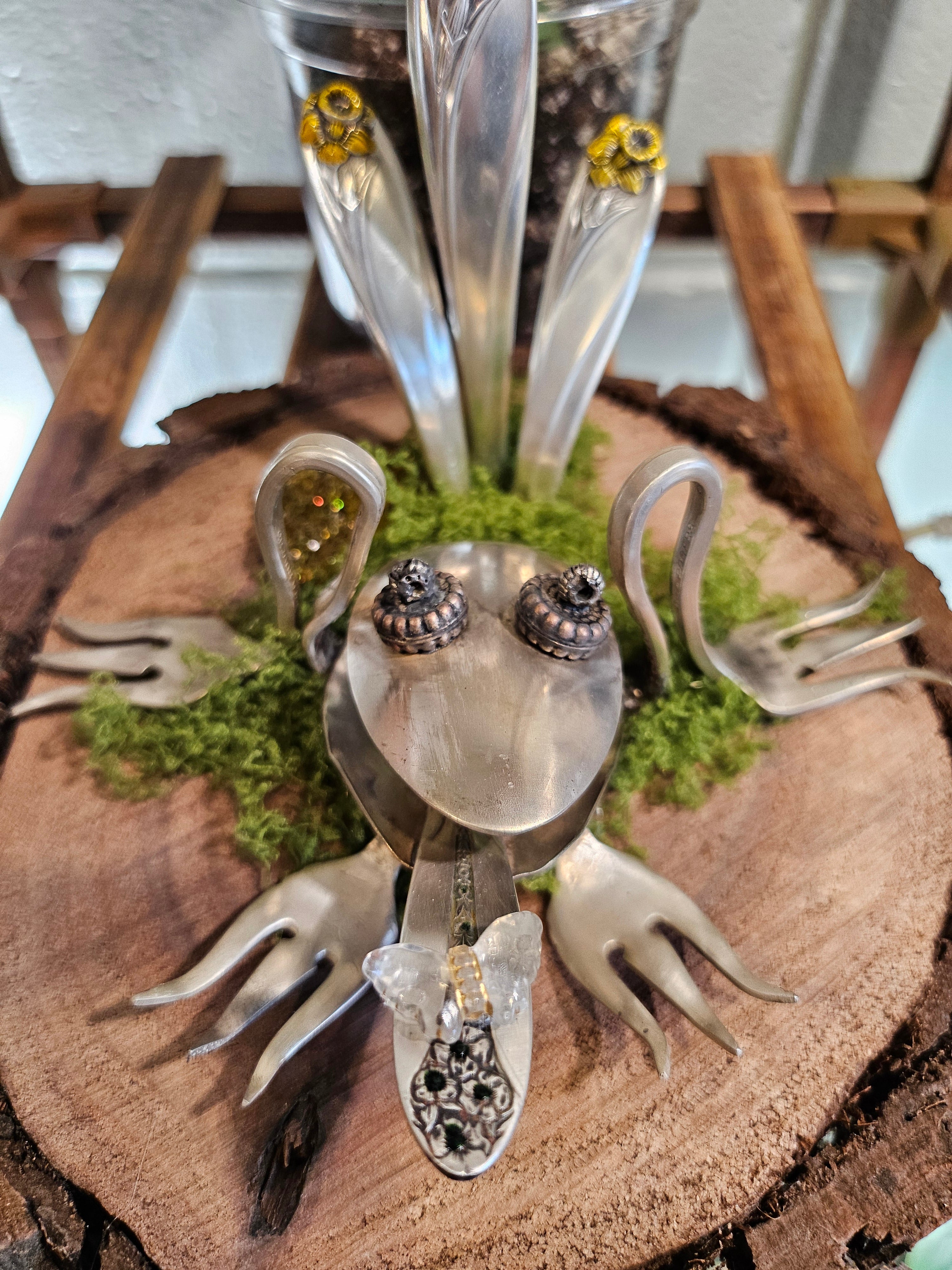 Handcrafted frog sculpture from vintage silverware, set on walnut wood with moss and crystals. A whimsical, one-of-a-kind piece for home or garden décor.