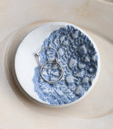 Handmade polymer clay dish with a green lace impression. Perfect as a jewelry or ring holder. Durable, decorative, and one-of-a-kind. Not food safe.