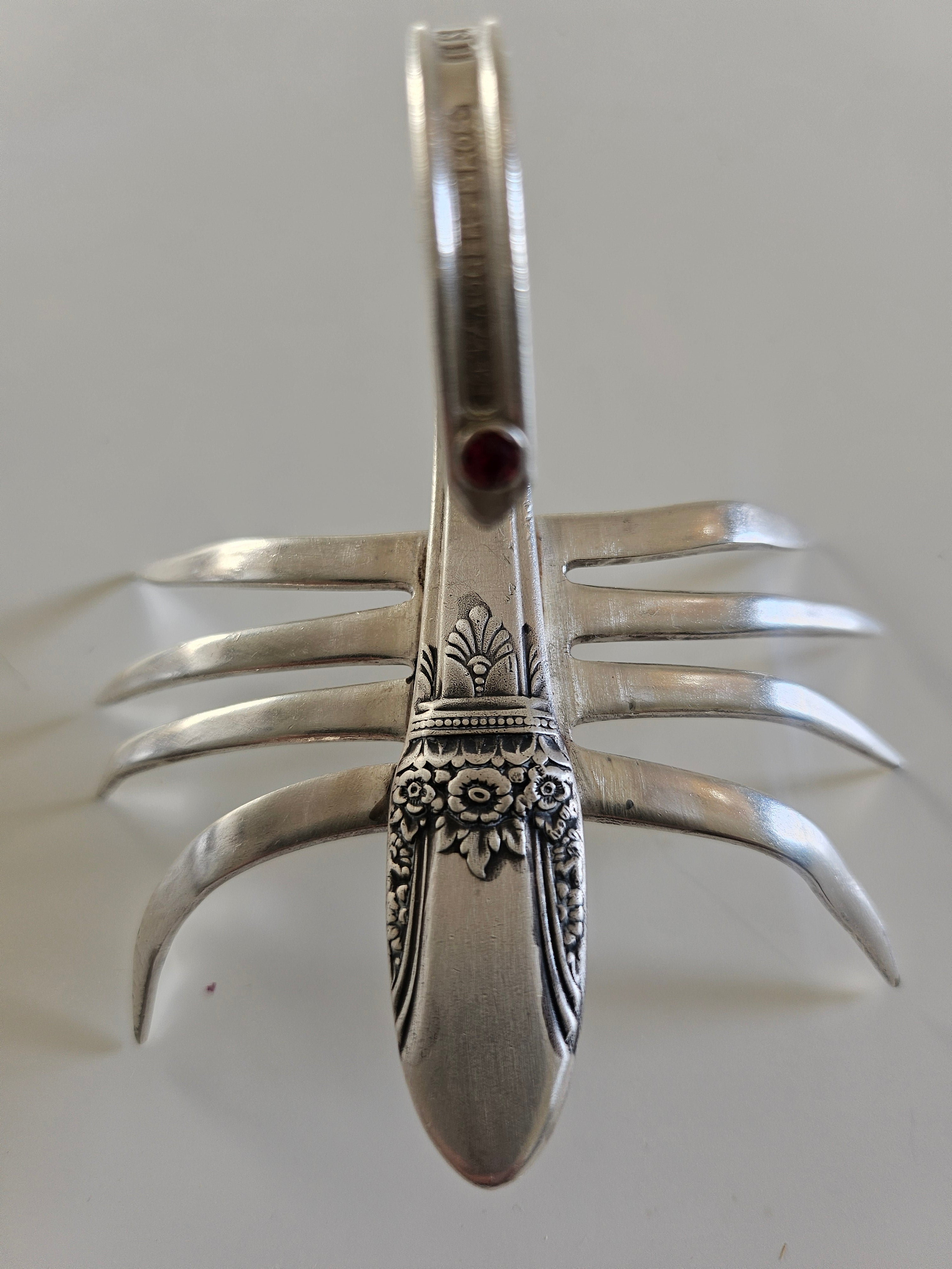 Handcrafted from vintage silverware, these salvaged scorpion and turtle sculptures bring charm, symbolism, and eco-friendly artistry to any space
