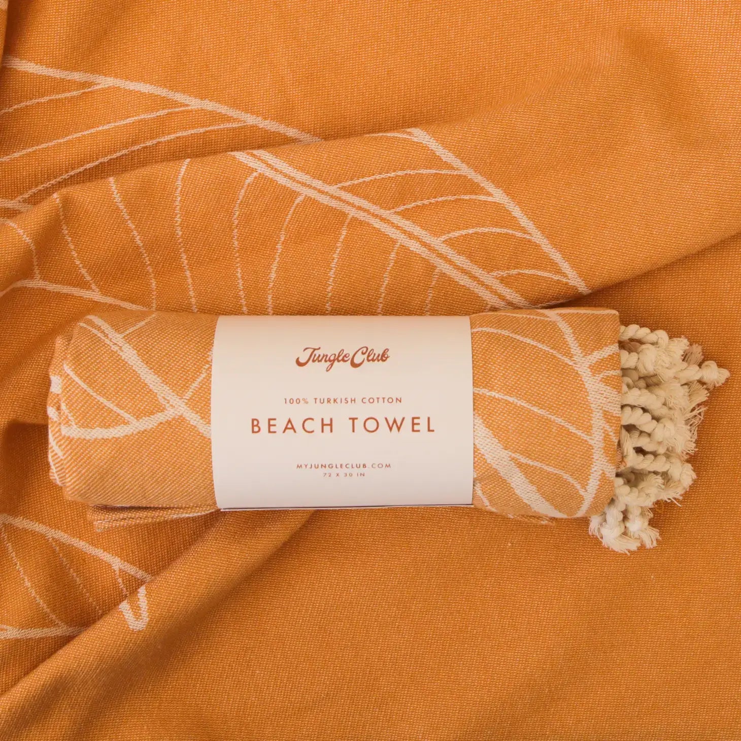 Ultra-absorbent, quick-drying beach towel with bold banana leaf print. Lightweight, sand-resistant, and perfect for beach days or poolside lounging.