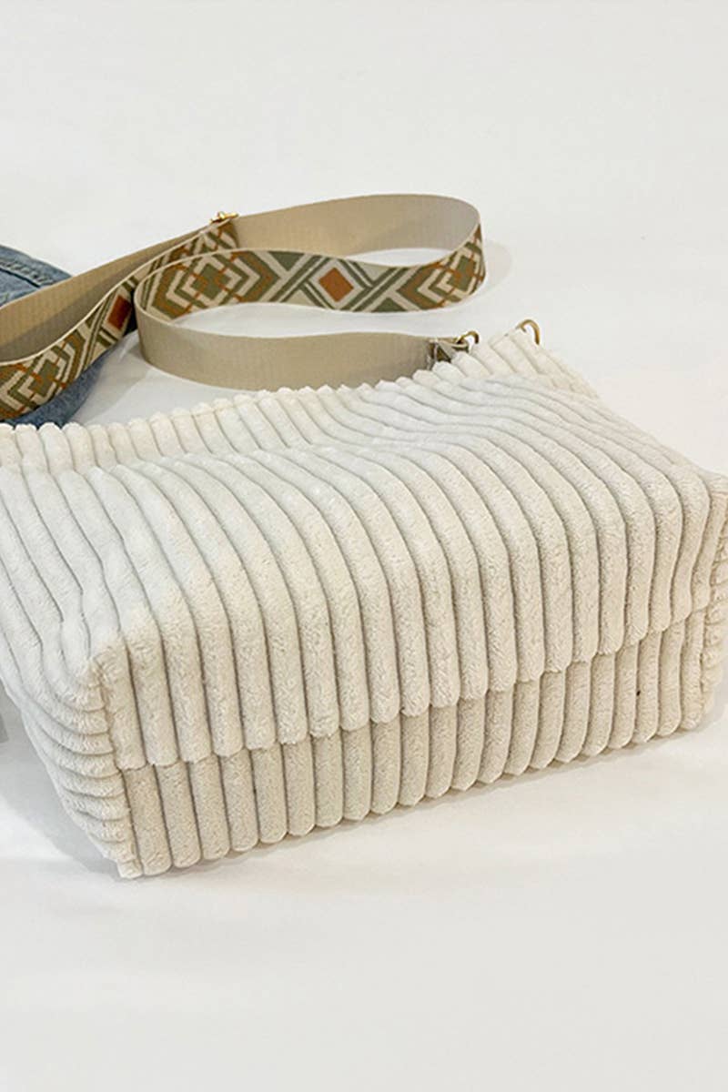 Corduroy Tote Bag with adjustable guitar strap, zipper closure and roomy design. A soft, stylish everyday shoulder bag for work, travel or nights out.