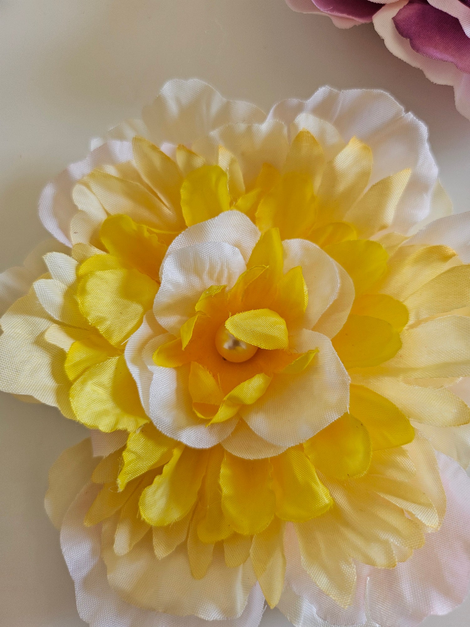 Handmade beaded flower clips for hair, bags, dresses and more. Colorful, fun, and one-of-a-kind—Spring Lemonade Foo Foo Flowers add flair anywhere you wear them!