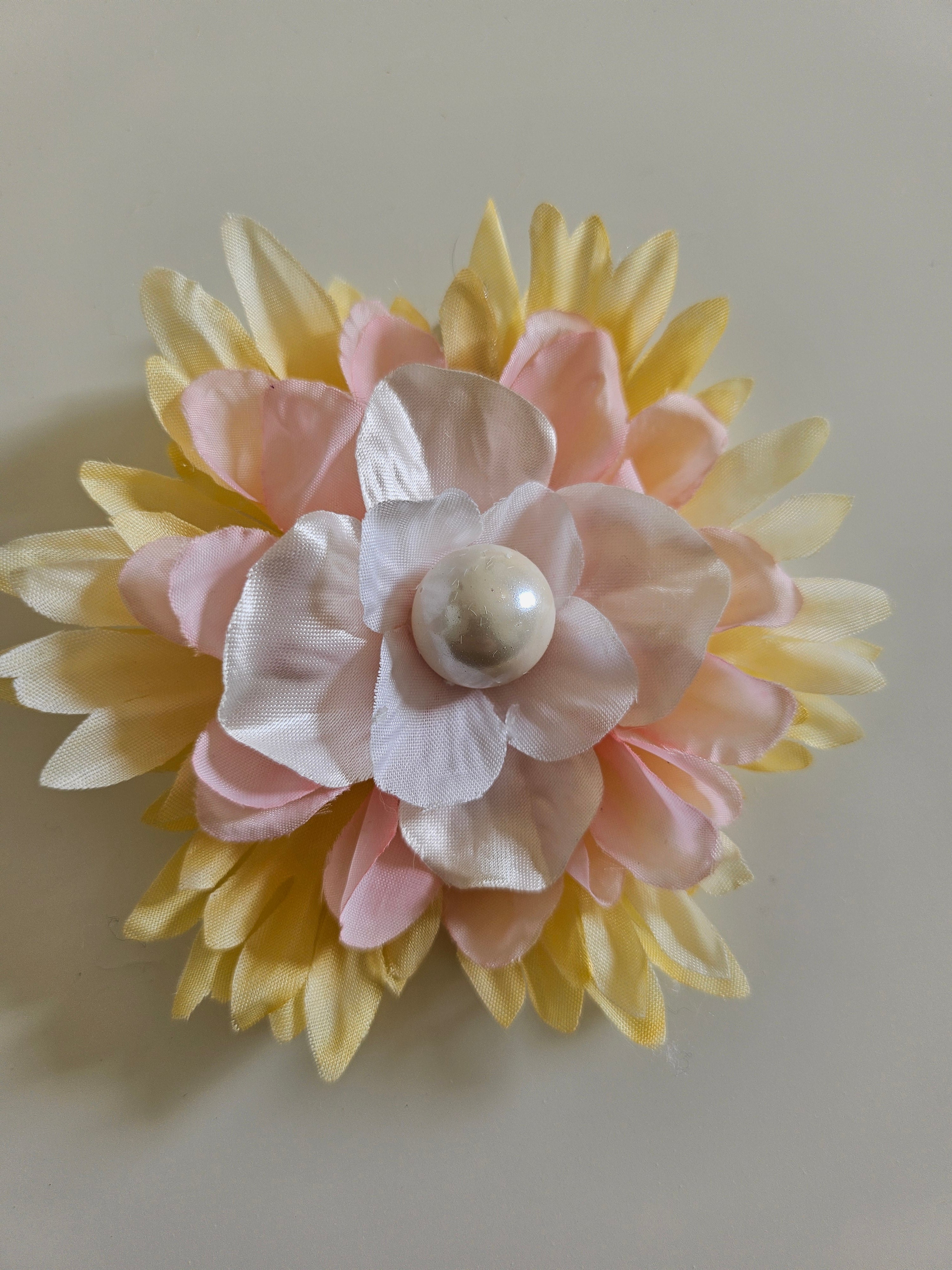 Handmade beaded flower clips for hair, bags, dresses and more. Colorful, fun, and one-of-a-kind—Spring Lemonade Foo Foo Flowers add flair anywhere you wear them!