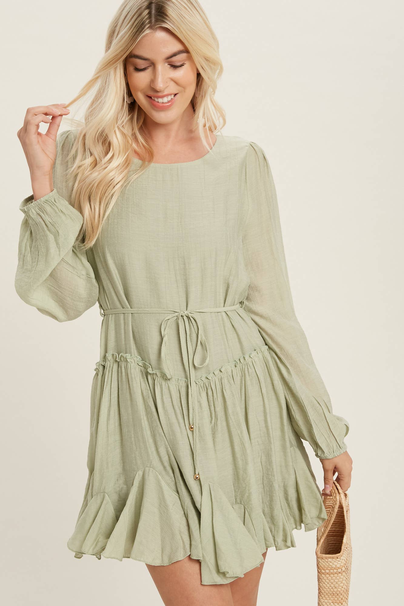 A flirty mini swing dress with balloon sleeves, ruffle trim, and adjustable waist. Lightweight, breathable, and perfect for everyday whimsy.