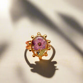 Golden Bloom Adjustable Ring with real dried flowers in resin and 18K gold-plated stainless steel. Unique, hypoallergenic, fits most, and perfect for gifting.