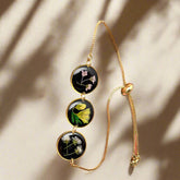 Wildflower Whisper Bracelet with real pressed flowers in resin and adjustable stainless-steel chain. Unique, hypoallergenic, and perfect for everyday nature lovers.
