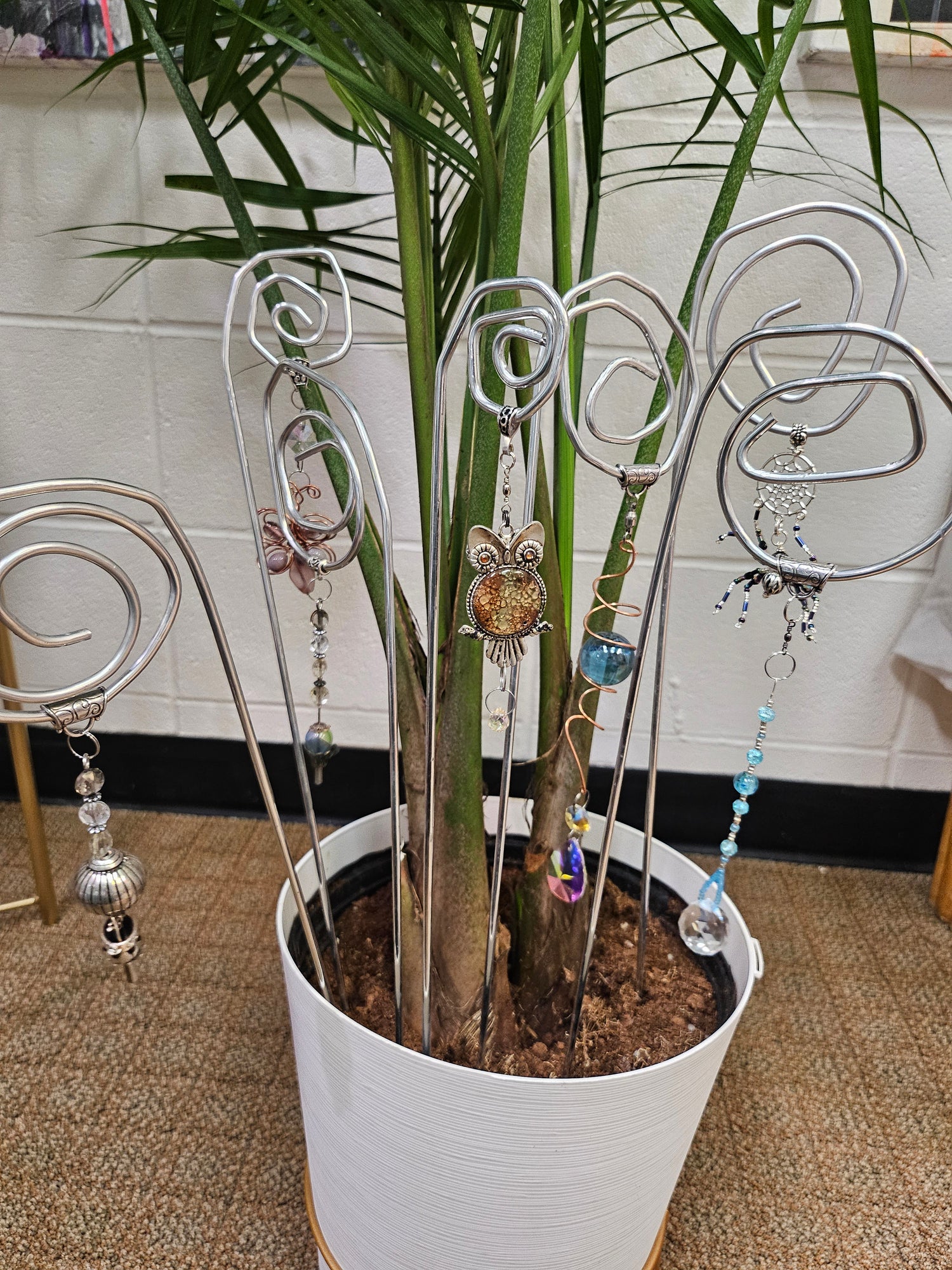 Handmade Copper Gemstone Tree with a copper wire trunk, wired branches, and tumbled gemstones on a rock base. Standing 7" tall, this unique, 10 lb. artisan-crafted piece symbolizes growth and beauty. Perfect as a meaningful gift or decor centerpiece, it adds natural elegance and timeless charm to any space.