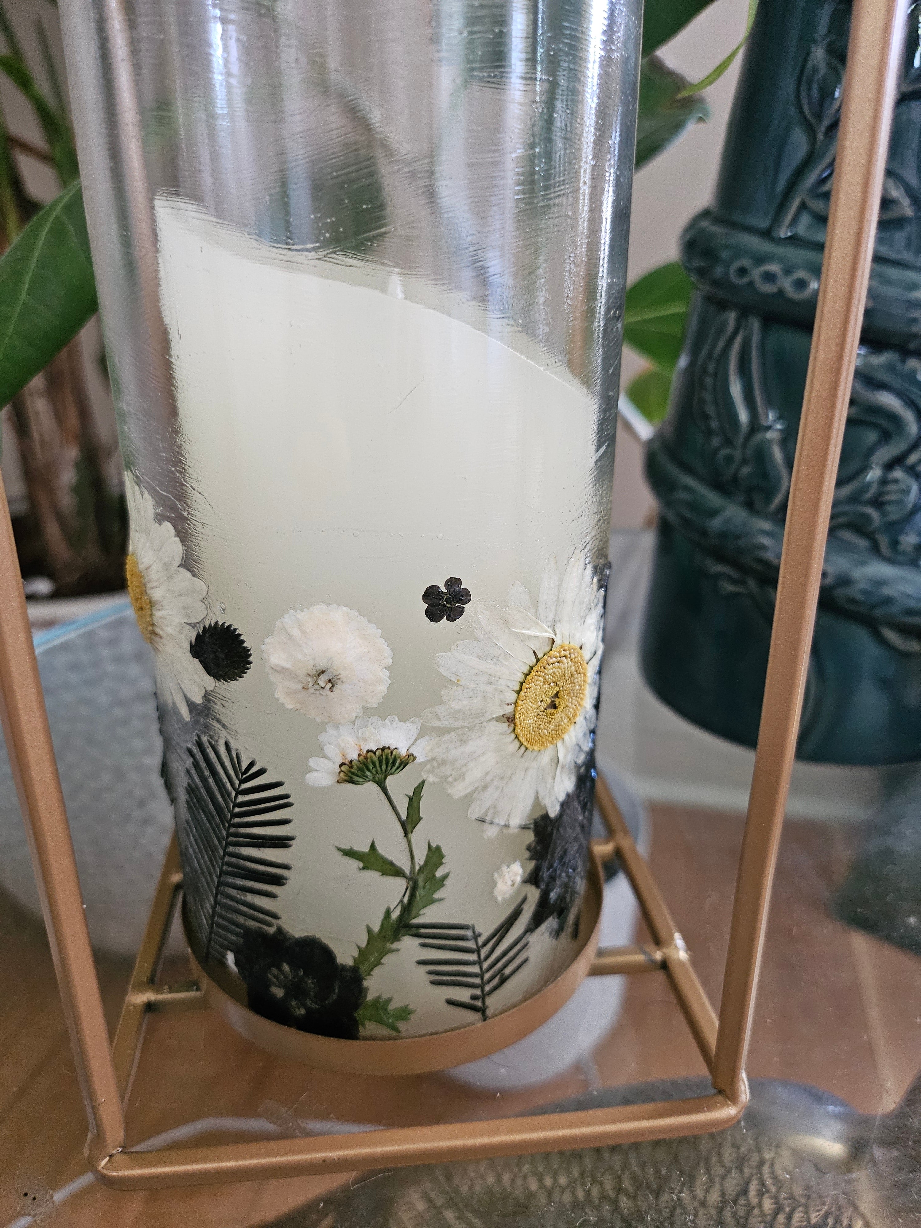 Fairy Pressed Flower Lantern with gold frame & glass panels glows with soft candlelight through real black & white flowers. 12" tall, perfect for spa or gift.