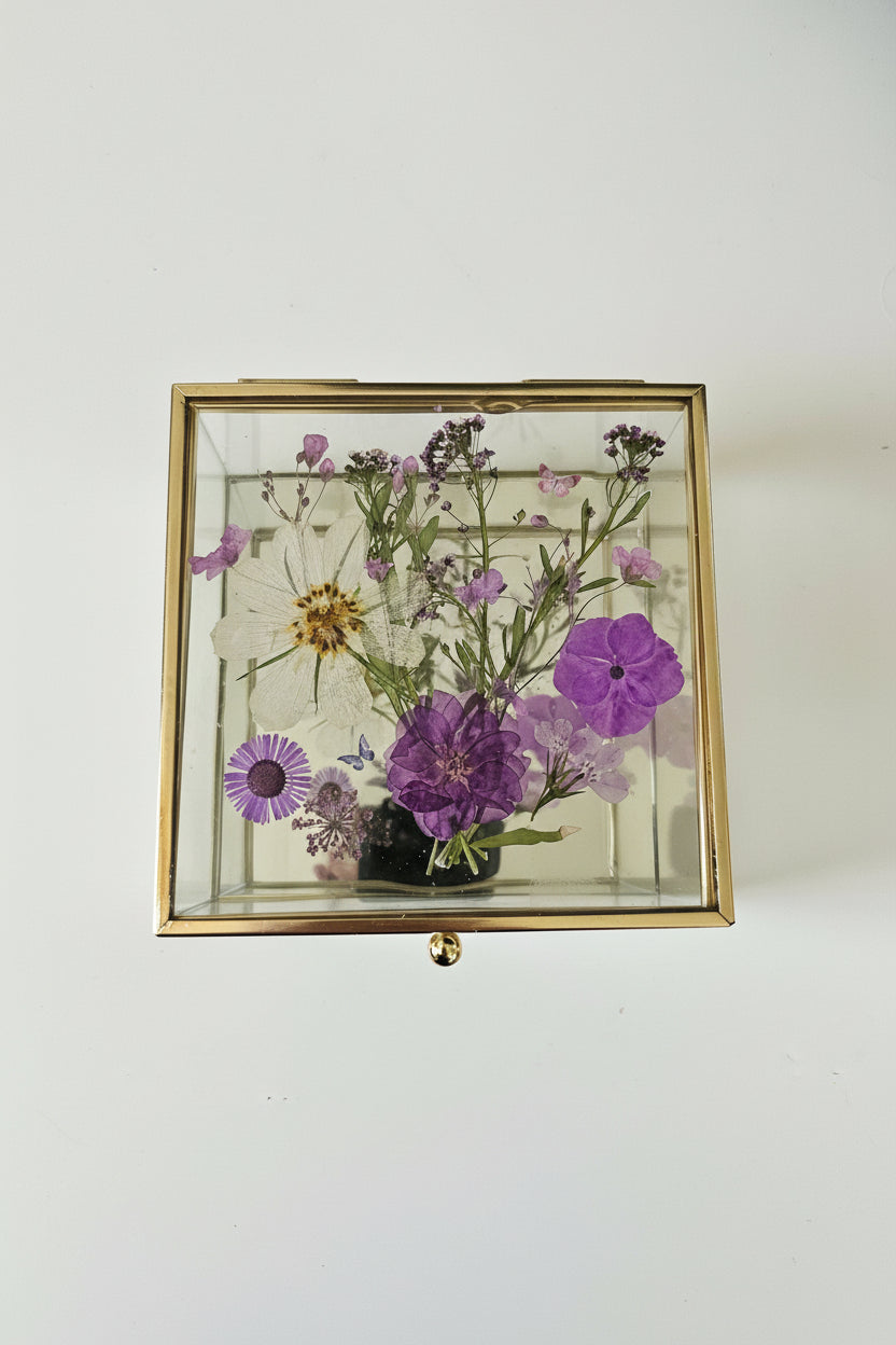 Floral mirrored keepsake and jewelry box with real pressed flowers. A 5" botanical glass box by artist Angel Singh, blending elegant storage with preserved floral art.