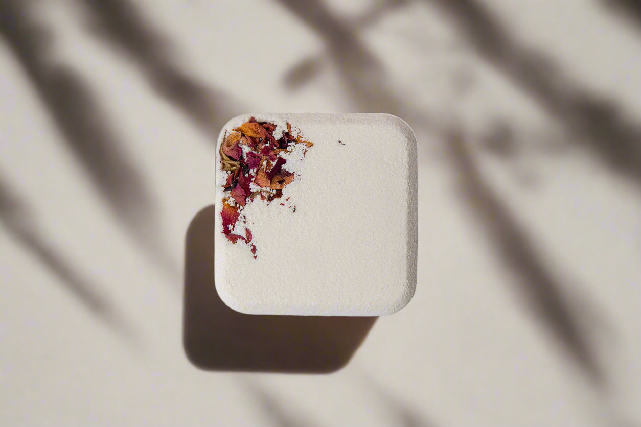 2oz handmade botanical bath bomb. Biodegradable wrap, rich oils, fizzy soak. Skin-softening, aromatic, and perfect for gifting or daily self-care rituals.