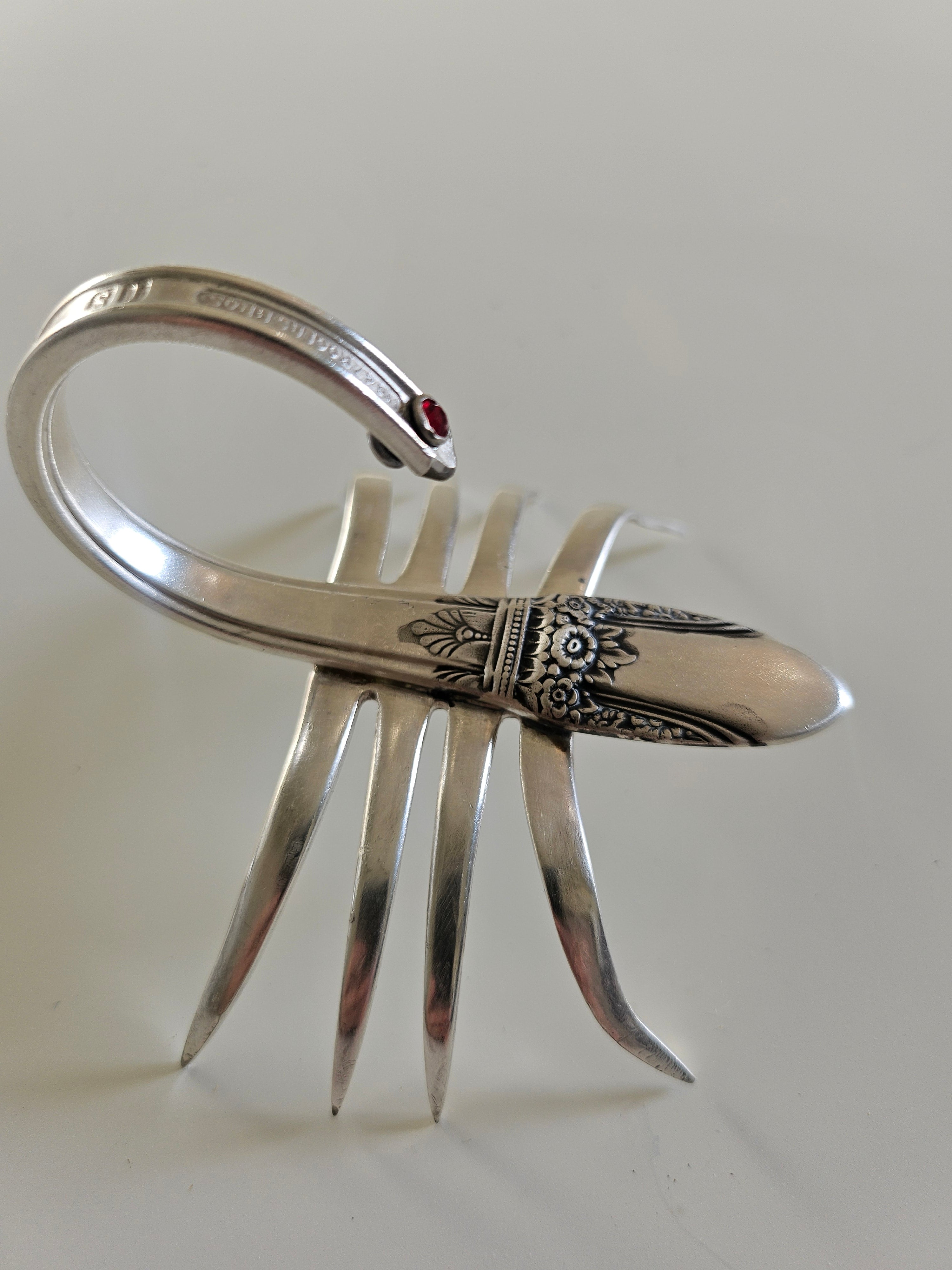 Handcrafted from vintage silverware, these salvaged scorpion and turtle sculptures bring charm, symbolism, and eco-friendly artistry to any space