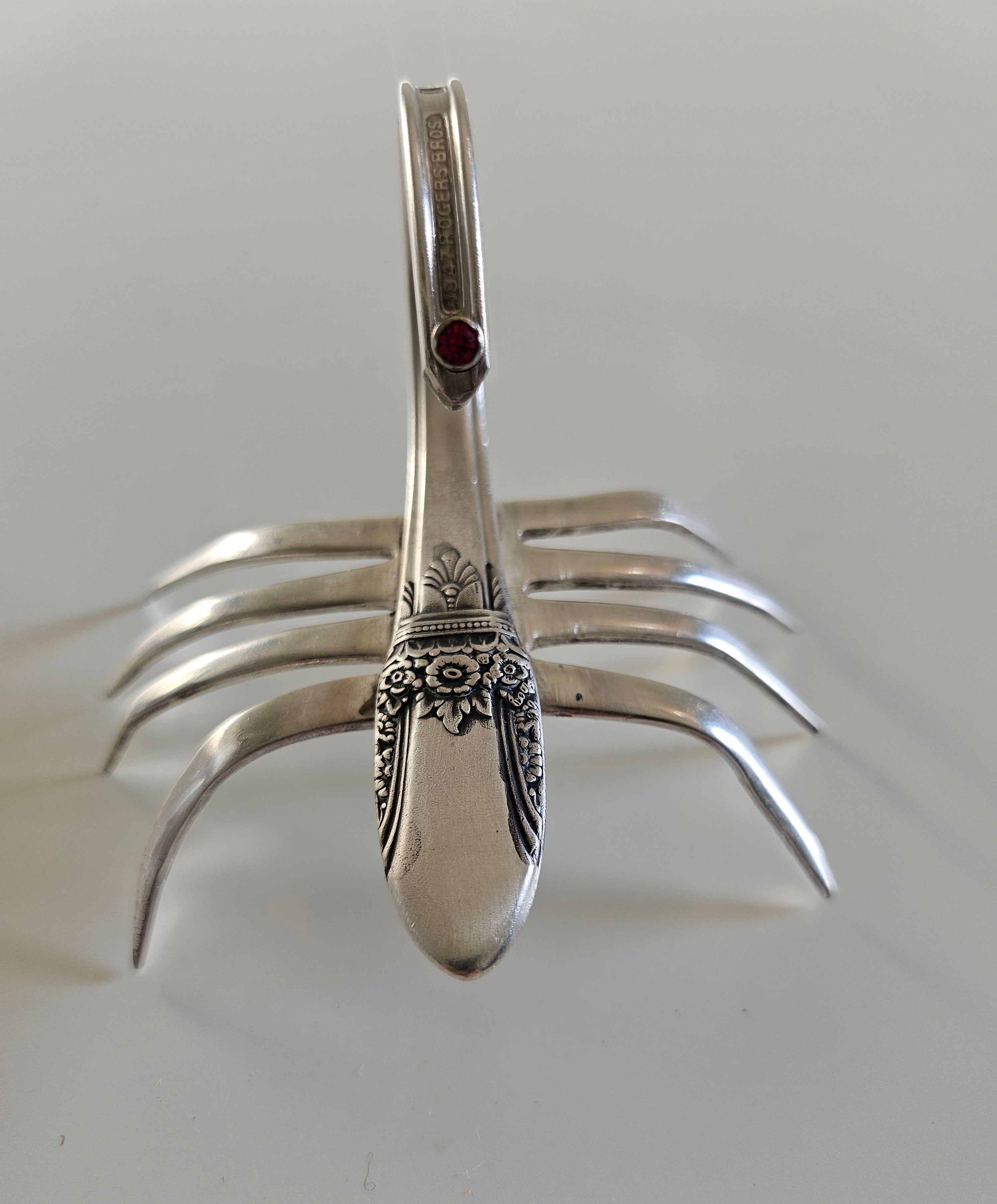 Handcrafted from vintage silverware, these salvaged scorpion and turtle sculptures bring charm, symbolism, and eco-friendly artistry to any space