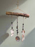 Add coastal charm to your space with the Shell & Bead Bohemian Suncatcher. Handcrafted with natural shells, semi-precious stones, and beads, it captures sunlight to create a stunning display of light and texture, perfect for windows, gardens, or as a unique, nature-inspired gift.
