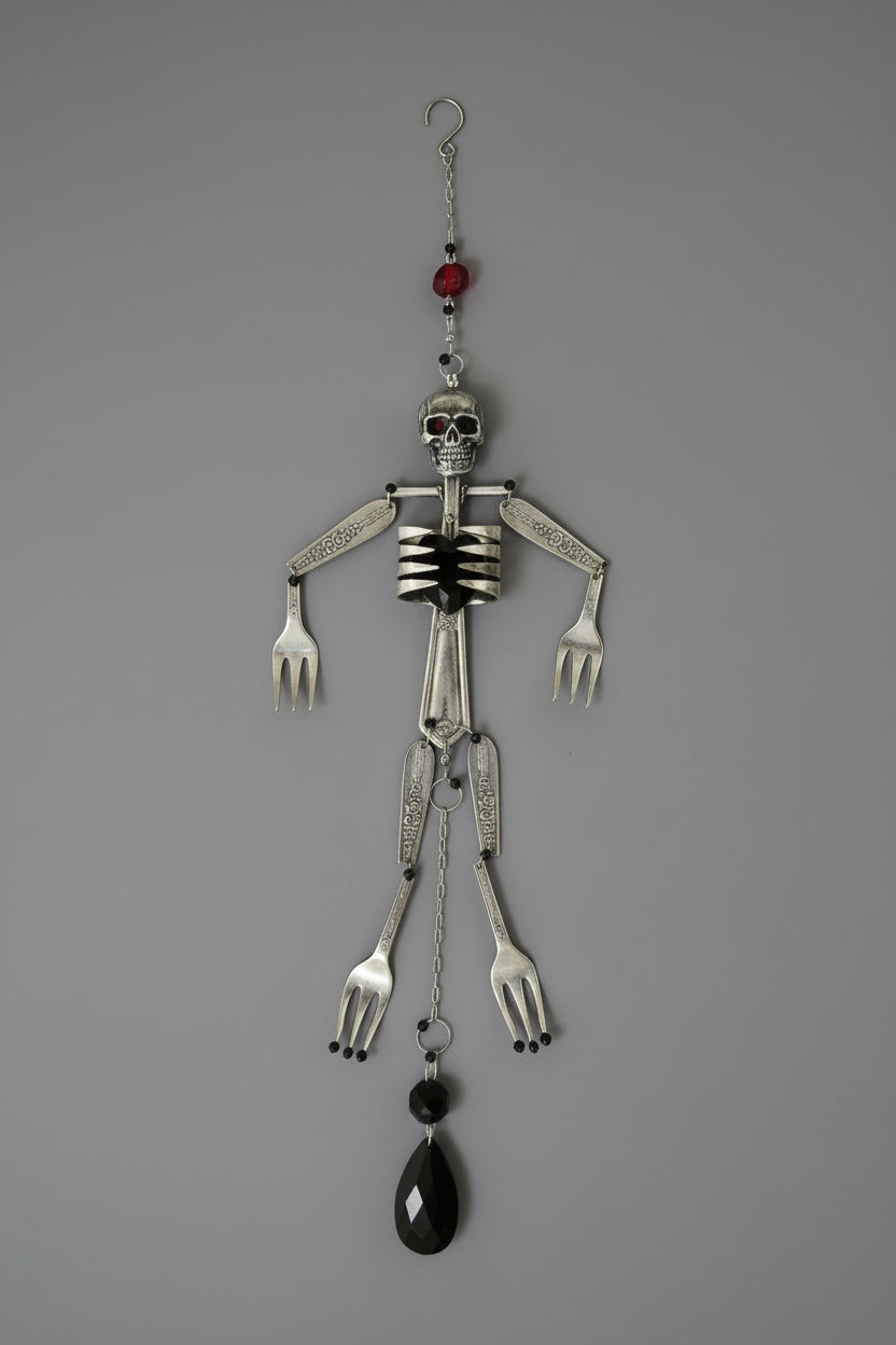 Skeleton Rattle & Bone Hanging Chime handcrafted from vintage silverware with crystal accent—whimsical skeleton wind chime with soft sound and one-of-a-kind charm.