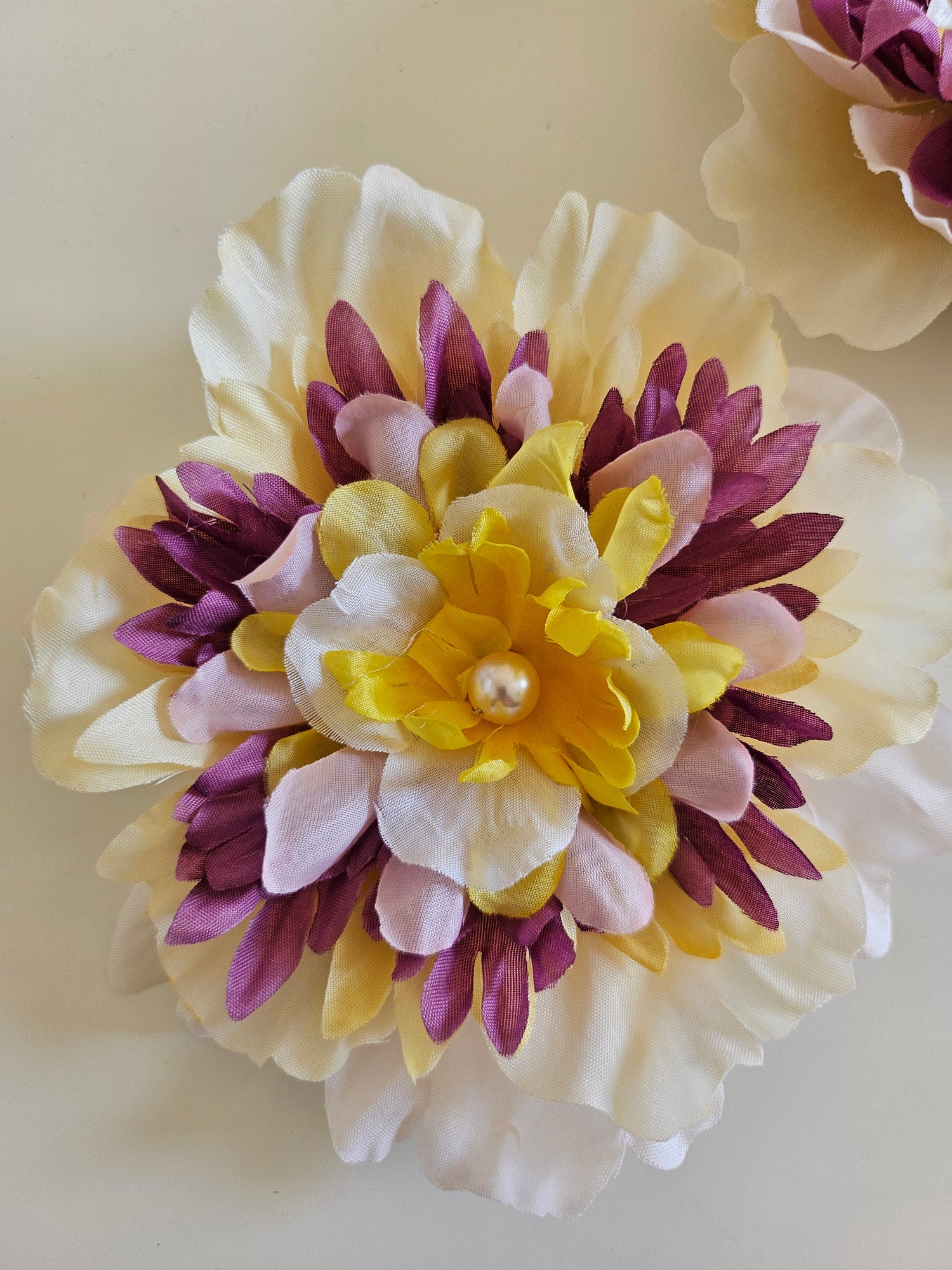 Handmade beaded flower clips for hair, bags, dresses and more. Colorful, fun, and one-of-a-kind—Spring Lemonade Foo Foo Flowers add flair anywhere you wear them!