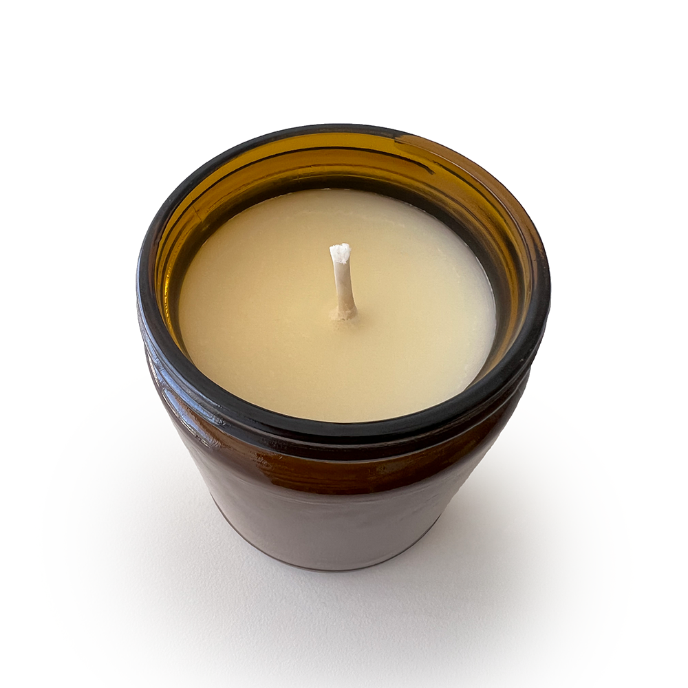 Plant Person: A fresh, earthy blend of tomato leaf, basil & green vines in a minimalist amber jar. Hand-poured soy candle with a 50+ hr burn.
