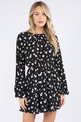 Starry Blossom Woven Dress with long sleeves, elastic waist & floral print. A chic black mini perfect for day-to-night style. Lined & lightweight.