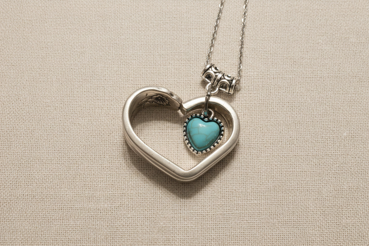 Handcrafted heart pendant made from vintage silverware. A unique, eco-friendly symbol of love—artisan-made in the USA and perfect for gifting or everyday wear.