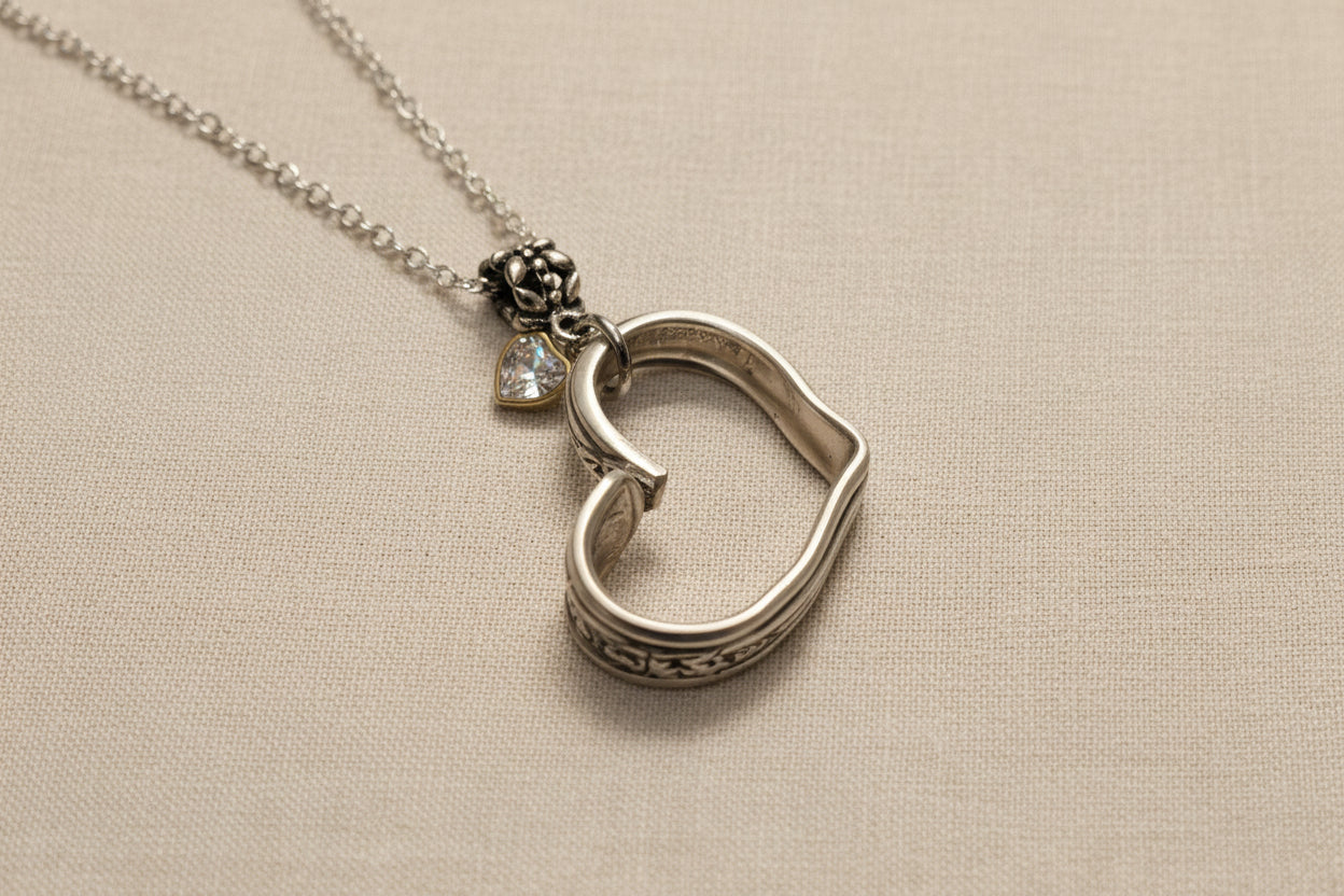 Handcrafted heart pendant made from vintage silverware. A unique, eco-friendly symbol of love—artisan-made in the USA and perfect for gifting or everyday wear.