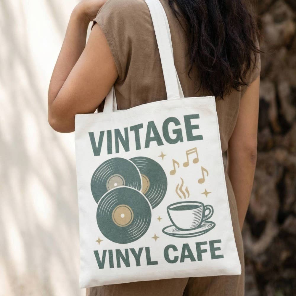 Vintage Vinyl Café Tote Bag featuring retro record shop artwork and a relaxed oversized design. Lightweight, stylish, and perfect for everyday essentials.