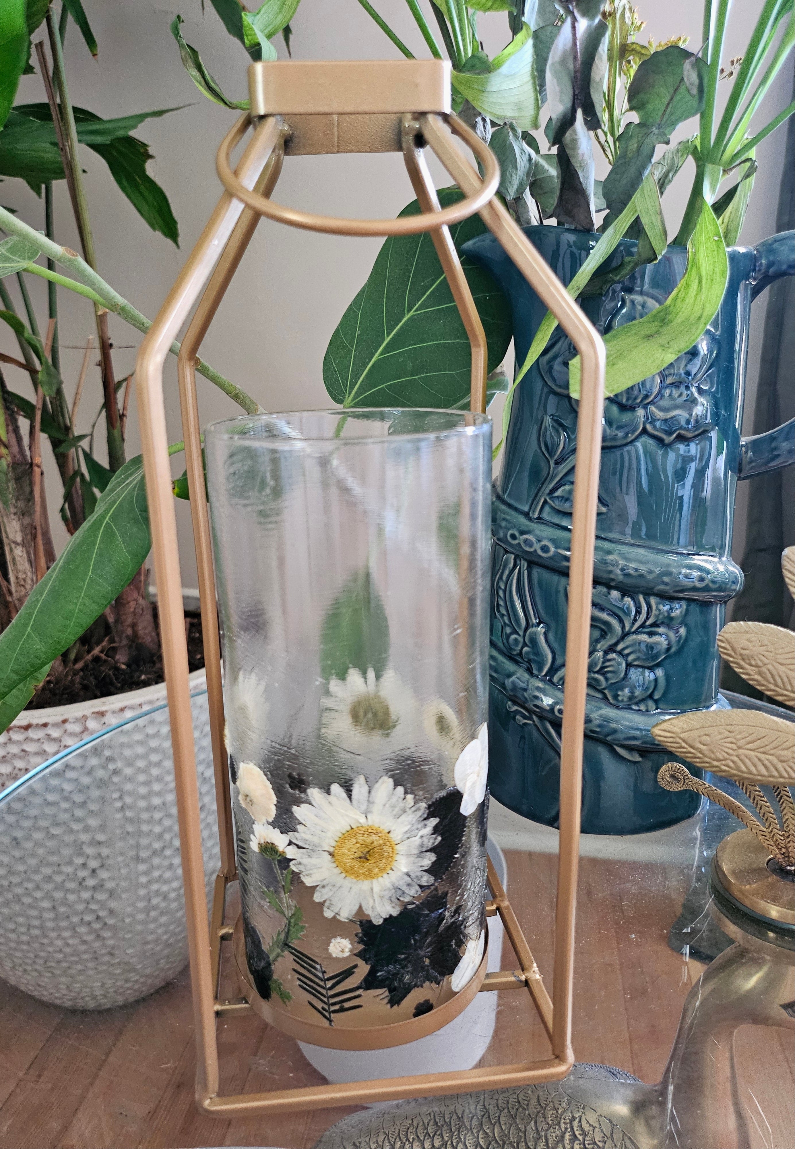 Fairy Pressed Flower Lantern with gold frame & glass panels glows with soft candlelight through real black & white flowers. 12" tall, perfect for spa or gift.